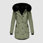 Green jacket with large lower pockets and dark cuffs.