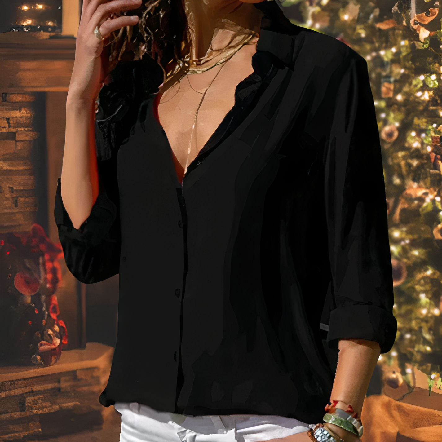 Black collared chiffon blouse worn indoors.