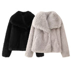 Black and pale faux-fur jackets shown together against white.