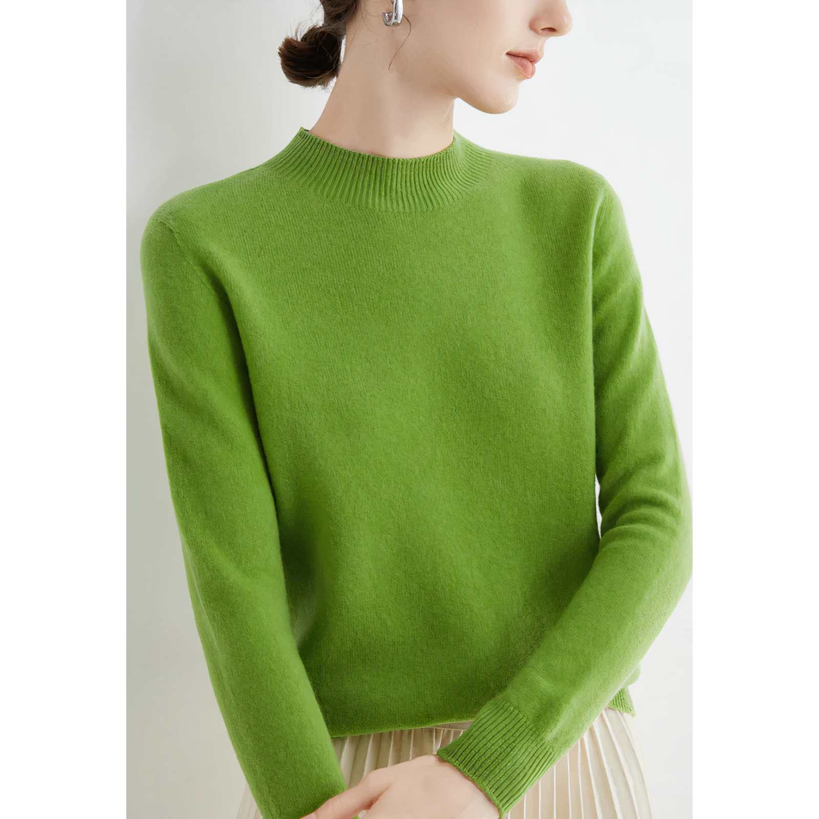 Bright green jumper shown from an angle.