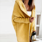 Yellow open cardigan with a wide hood and ribbed sleeves.