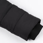 Black padded sleeve with a ribbed inner cuff.
