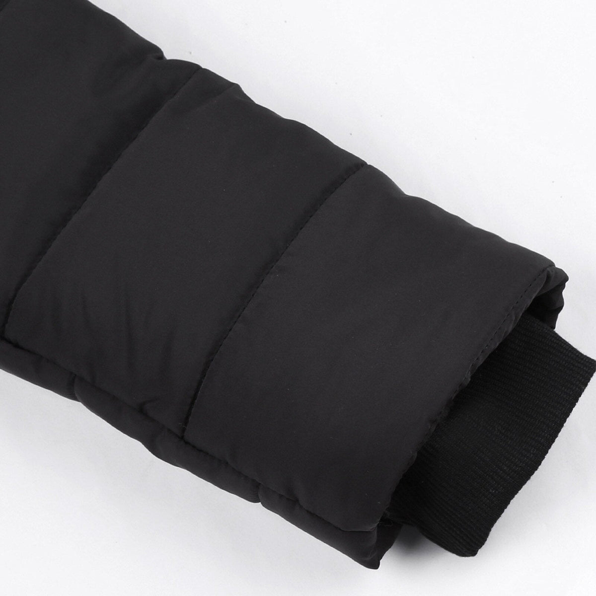 Black padded sleeve with a ribbed inner cuff.