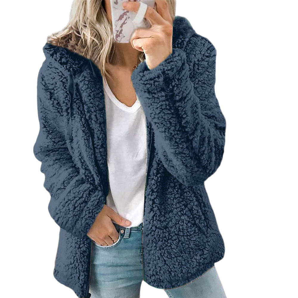Blue teddy fleece coat with a textured surface.