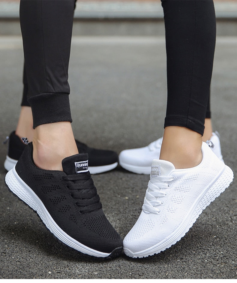 Black and white trainers shown together.