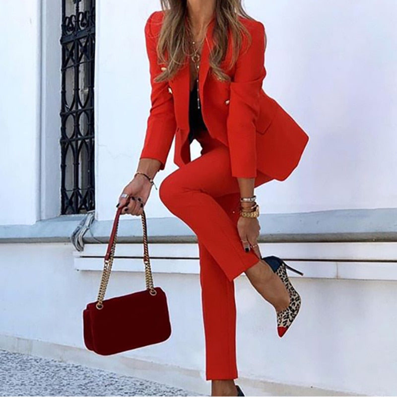 Red Abigail blazer and trouser set with front button details.