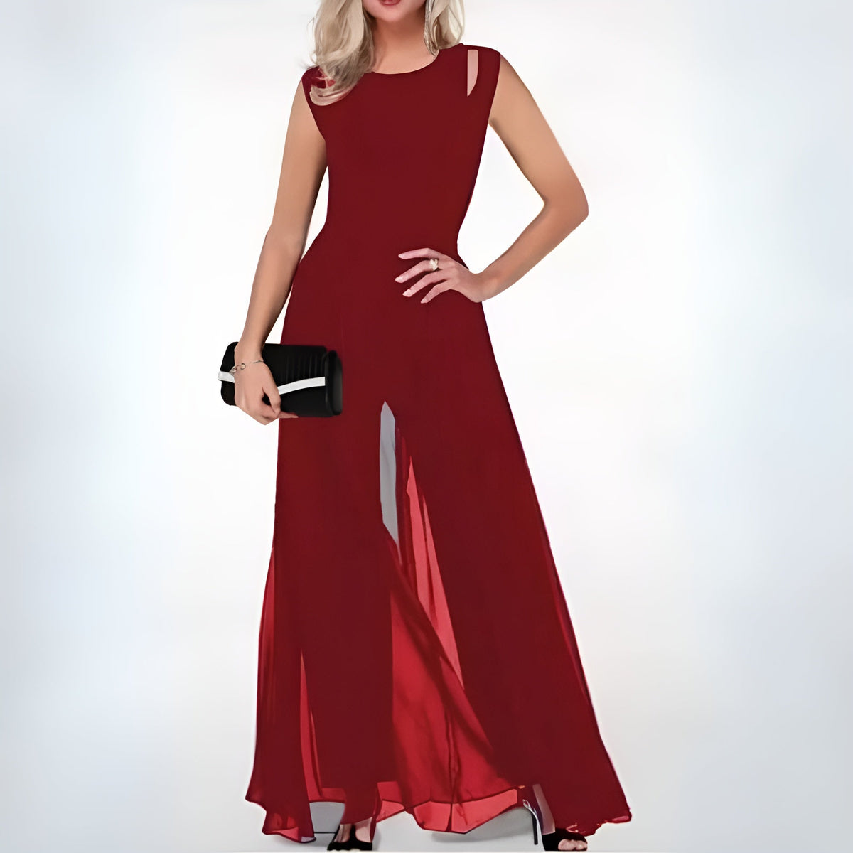 Red sleeveless Faelan jumpsuit with shoulder cutouts and wide legs.