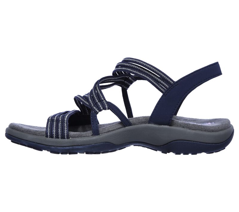 Side view of a blue sandal with striped straps and a grey sole.