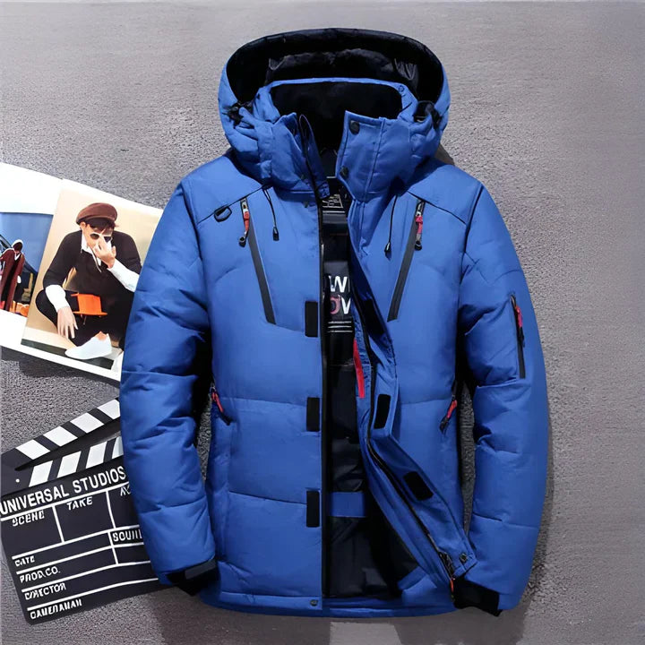 Blue hooded jacket showing dark trim and zip pockets.
