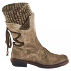 Khaki boot with a brown ribbed cuff and a dark sole.