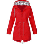 Red coat with a striped hood lining, front zip and waist drawstrings.