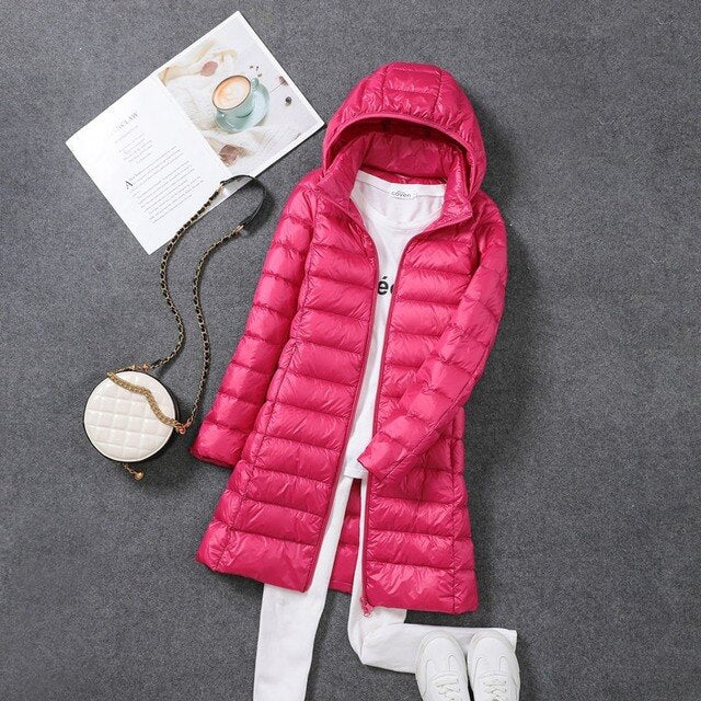 Rose-coloured hooded puffer coat with horizontal quilting.