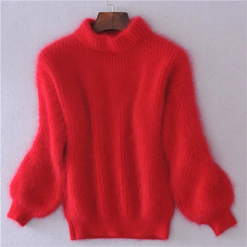 Red fuzzy knit jumper with a high neck and ribbed lower hem.