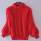 Red fuzzy knit jumper with a high neck and ribbed lower hem.