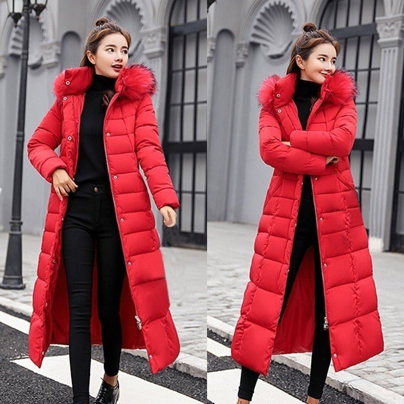 Red long quilted coat shown open over black clothing.