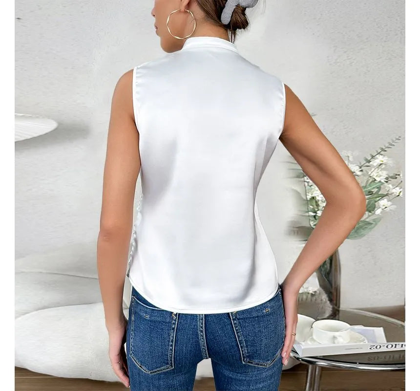 Back view of the white sleeveless top.