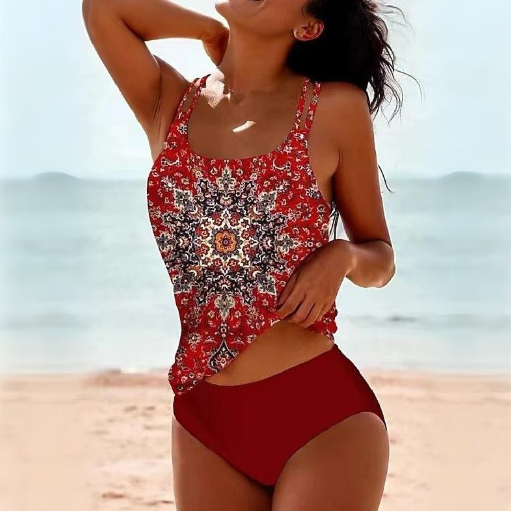 Red patterned tankini top with solid red briefs.