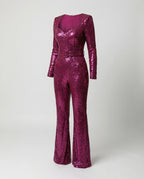 Pink sequin jumpsuit displayed with its matching waist detail.