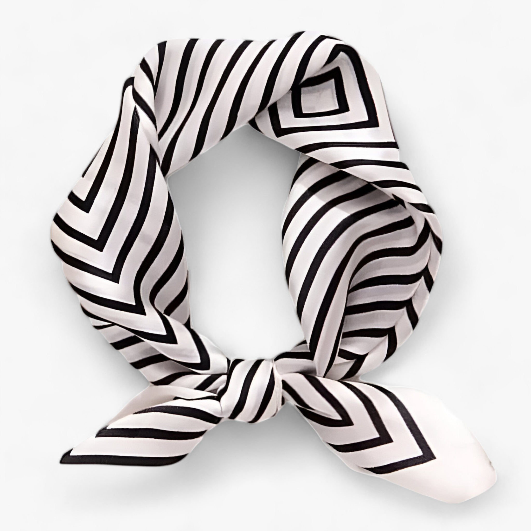 Black-and-white geometric striped scarf tied at the front.