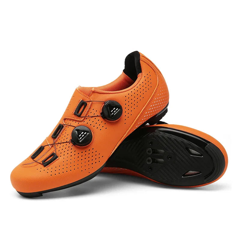 Orange shoes shown with a mostly smooth black sole.