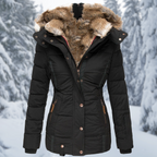 Front view of a black quilted jacket with plush hood lining and zipped side pockets.