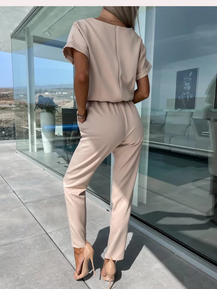 Rear view of the khaki jumpsuit.