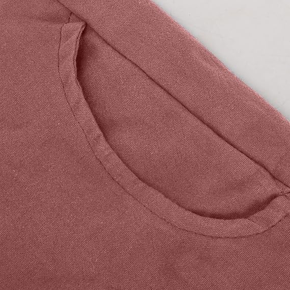 Close-up of the muted red curved pocket opening.