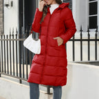 Red hooded puffer coat with horizontal quilting and hip pockets.