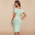 Back view of the light-green dress showing its zip.