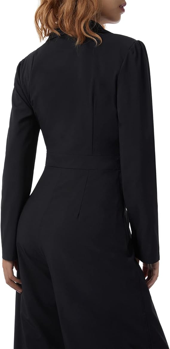 Rear view of a black jumpsuit showing the waist seam.