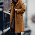 Golden camel faux-fur coat with a hood and long sleeves.