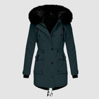 Dark green parka with faux-fur hood trim and a drawstring waist.