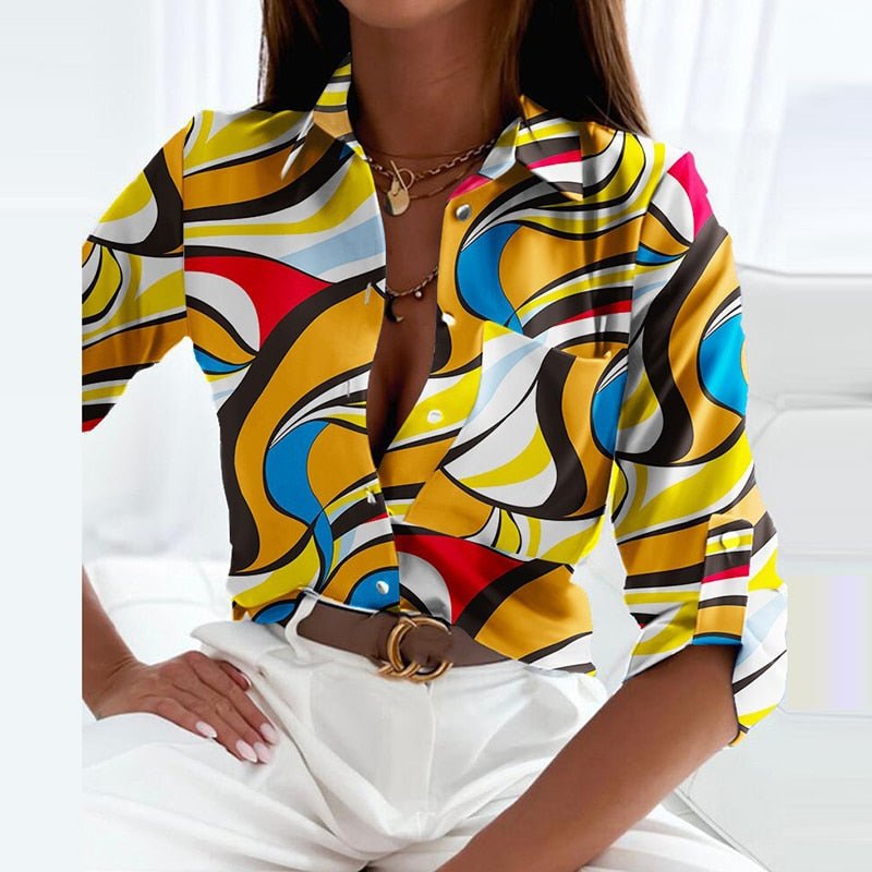 Multicoloured abstract-print blouse with a turn-down collar.