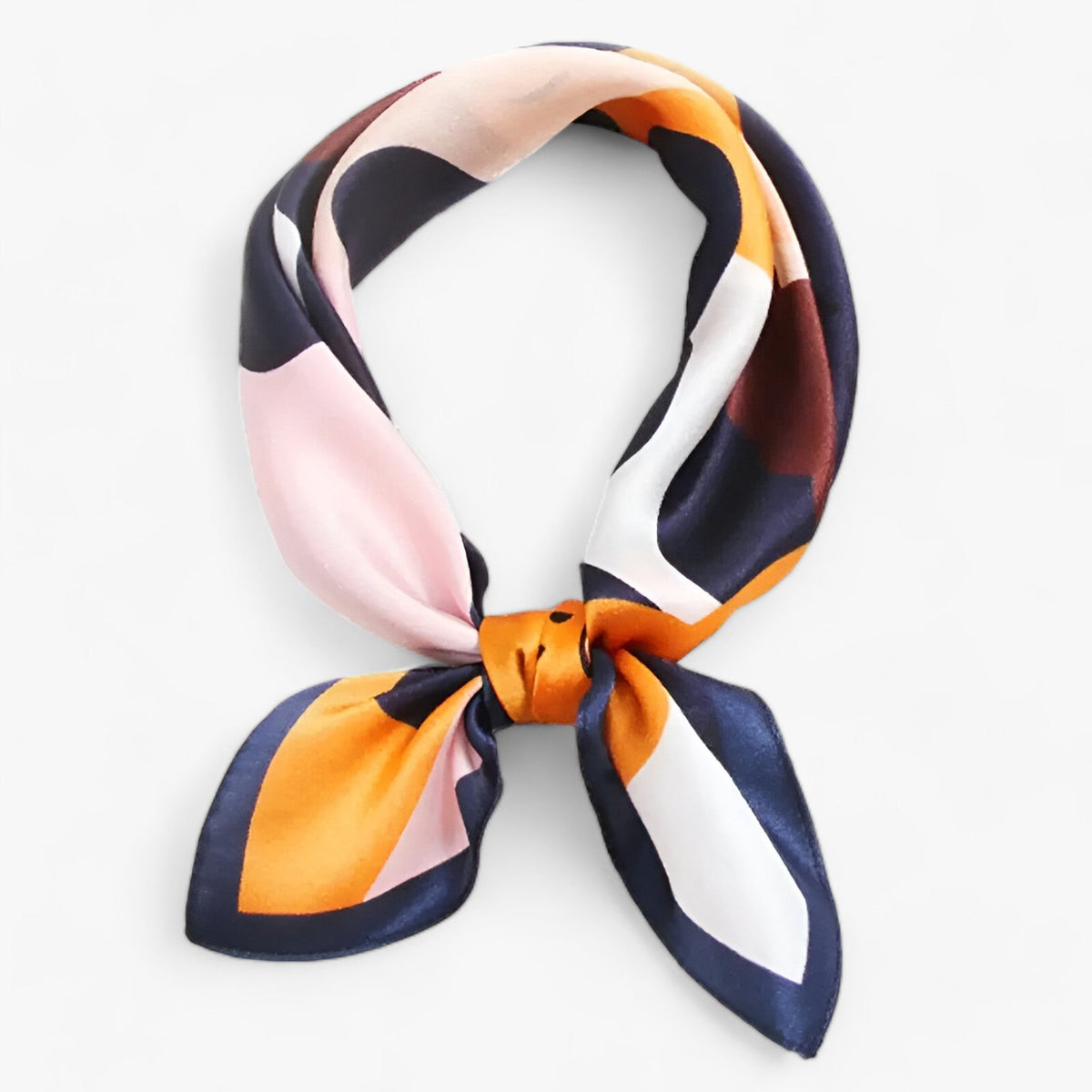 Pink, orange and navy patterned scarf tied at the front.
