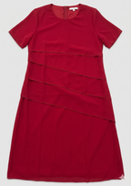 Red layered dress laid flat, showing short sleeves and an upper-back zip at the neckline.