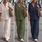 Three views of pale cream, olive-green and navy collared shirts with matching loose trousers.