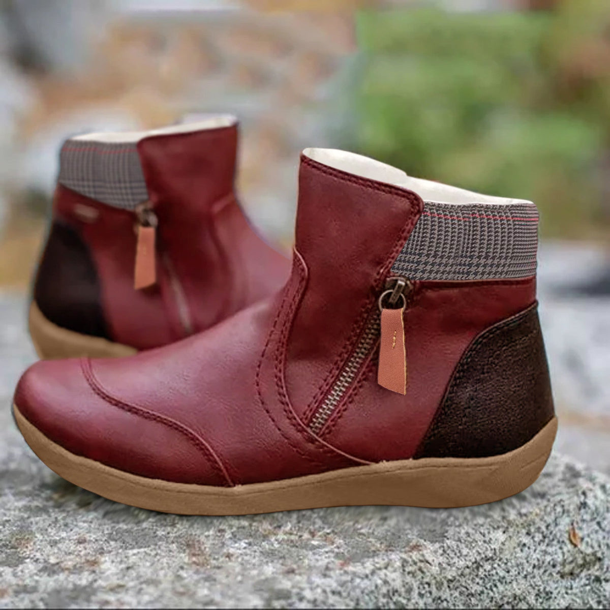 Red ankle boots with checked collars and dark contrasting heel panels.