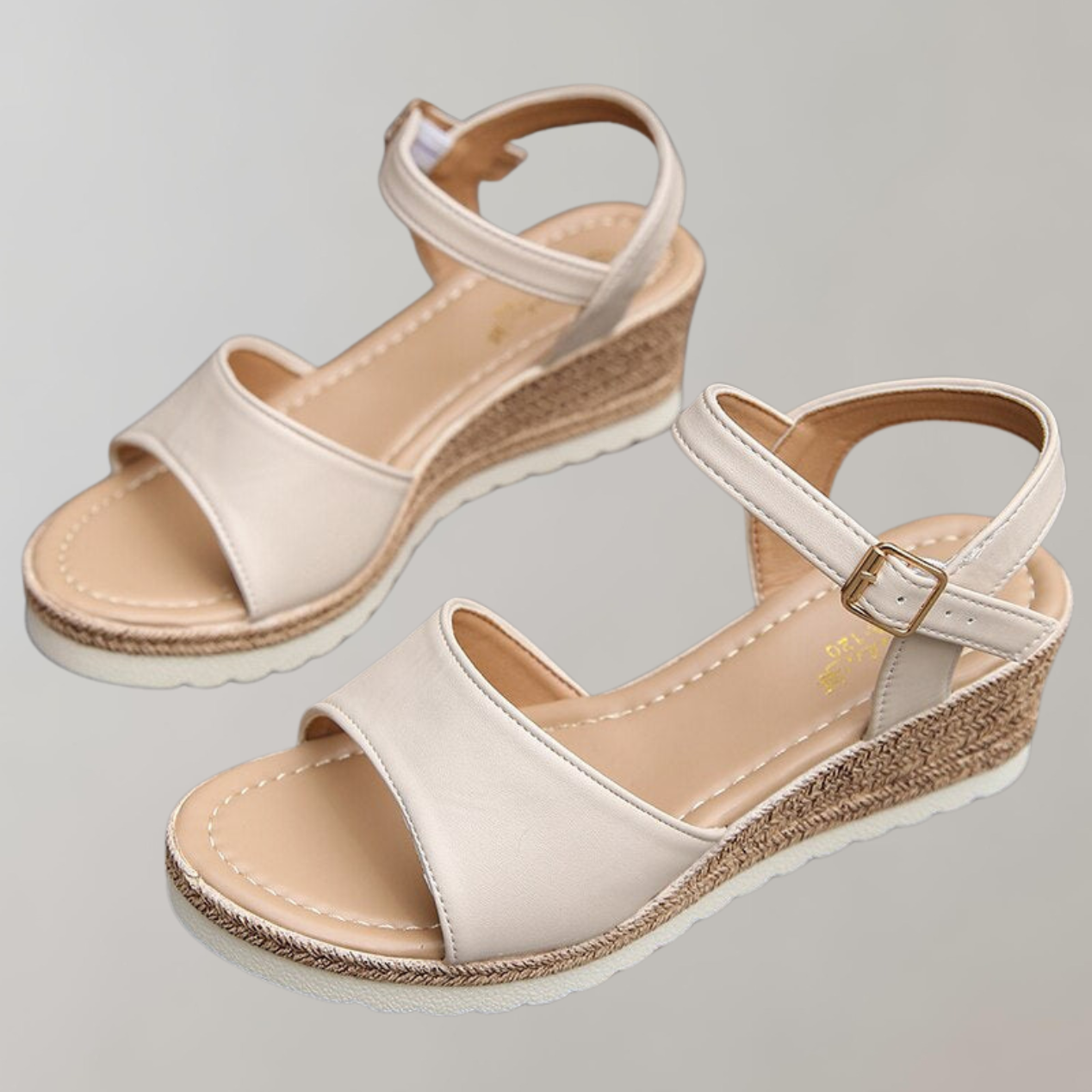 Beige wedge sandals showing the footbeds and open heels.