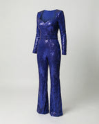 Blue long-sleeved sequin jumpsuit displayed on its own.