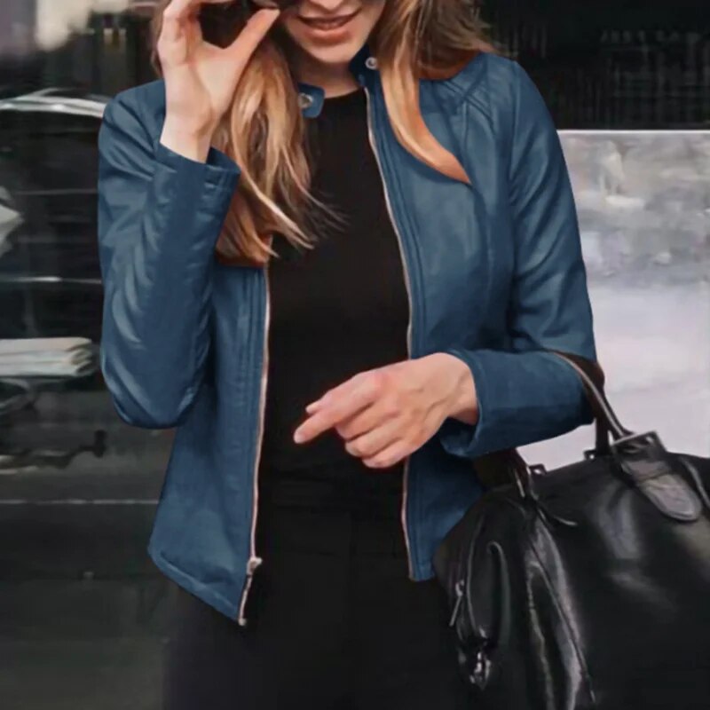 Dark Blue smooth zip-front jacket with a short stand collar, worn over black clothing.