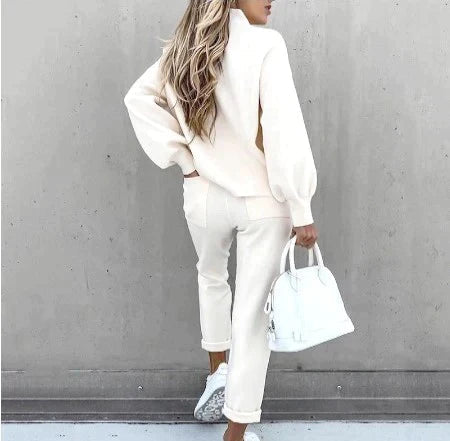 Rear view of the white lounge set showing trouser pockets.