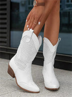 White perforated western boots with pull tabs.