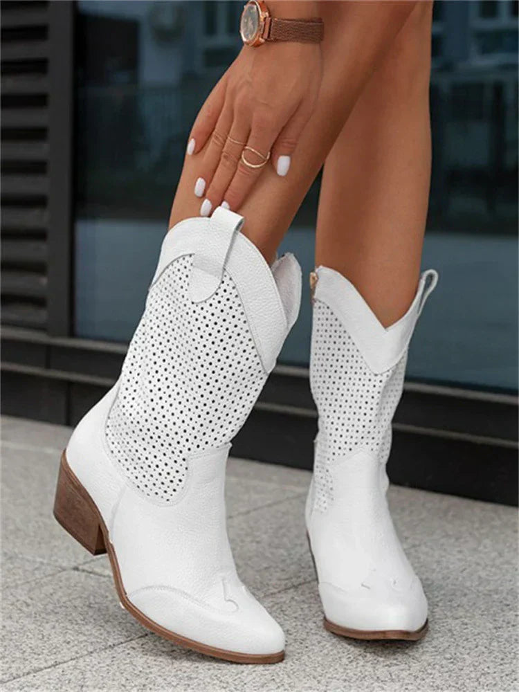 White perforated western boots with pull tabs.