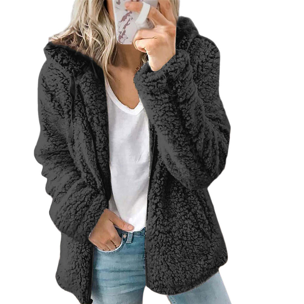 Black teddy fleece coat with long sleeves.