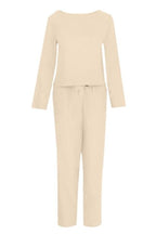 Beige two-piece set shown flat against a white background.