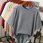 Grey marl crew-neck T-shirt with a loose body.