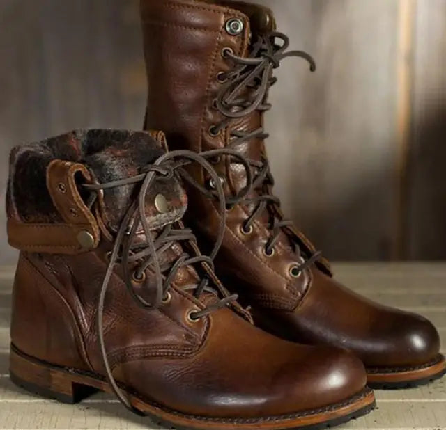 Brown lace-up boots shown with one cuff folded to reveal the lining.