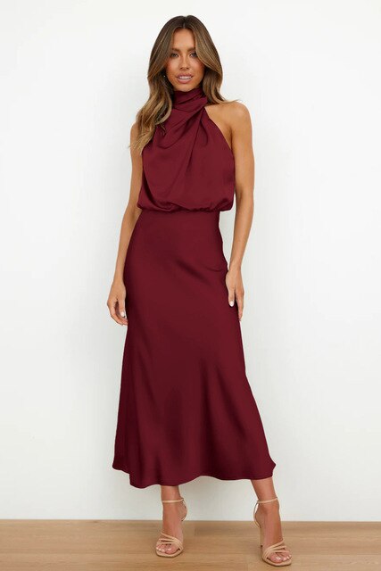 Burgundy midi dress with a draped bodice.