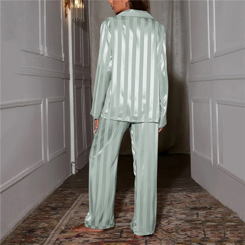 Back view of the green striped satin pyjama set.