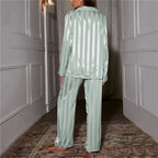 Back view of the green striped satin pyjama set.